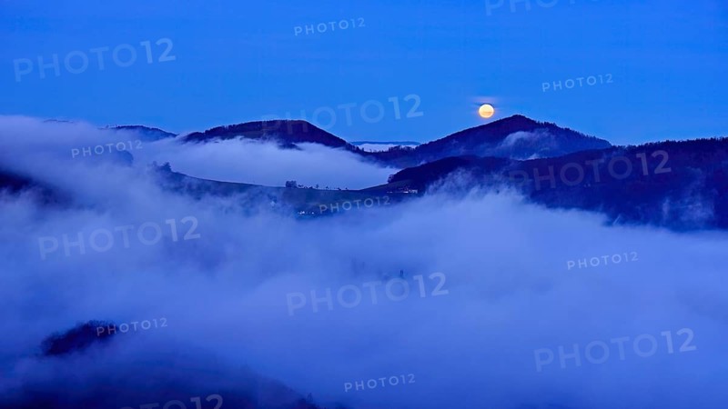 View from the Gisliflue of the Jurassic foothills covered in fog from the left, Asperstrihen, Strihen, in the light of the full moon, Talheim, Canton, Aargau, Switzerland