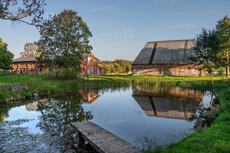 Historic buildings, pig and poultry house and pond of a manor from 1923, Othesdorf, Mecklenburg-Western Pomerania, Germany