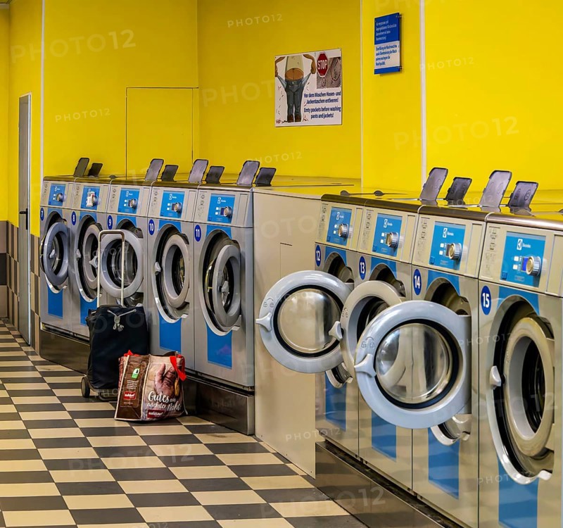 Washing machines in a public laundromat, Frankfurt am Main, Hesse, Germany