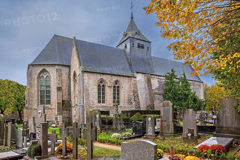 12th century Church of Our Lady, Onze-Lieve-Vrouwekerk in the village Wulveringem in autumn, fall, Veurne, West Flanders, Belgium