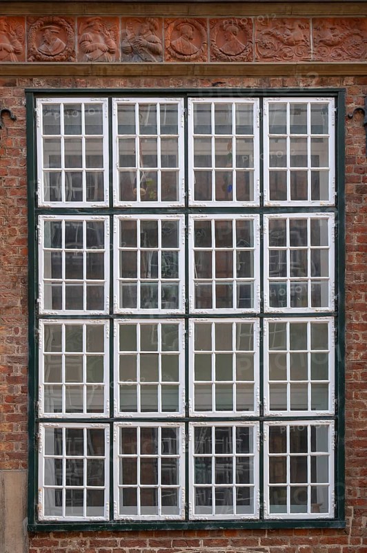 Historic windows, top with terracotta decoration, Renaissance façade, around 1560, Mengstraße 27, Hanseatic City of Lübeck, Schleswig-Holstein, Germany