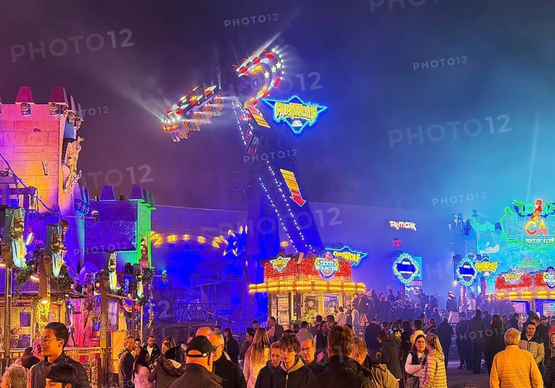 Many people at the All Saints Fair at night, the biggest old town fair in Europe, Soest, North Rhine-Westphalia, Germany