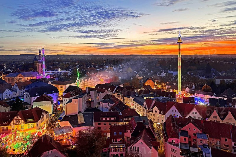 View from above from the Ferris wheel of the atmospheric All Saints Fair in the evening, Altstadt, Soest, North Rhine-Westphalia, Germany