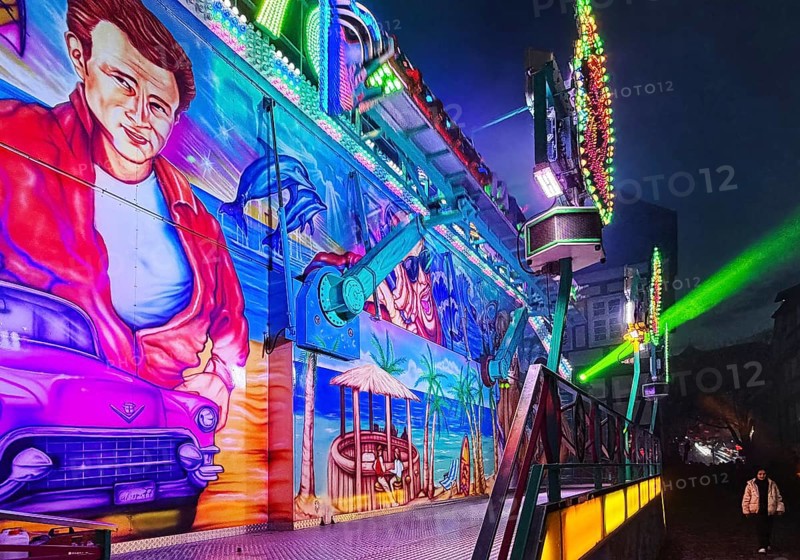 Colourfully illuminated All Saints Fair at night, the largest old town fair in Europe, Soest, North Rhine-Westphalia, Germany