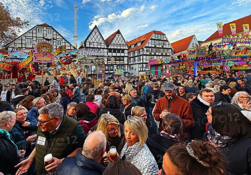 Many people at the All Saints Fair in front of half-timbered houses, largest old town fair in Europe, Soest, North Rhine-Westphalia, Germany