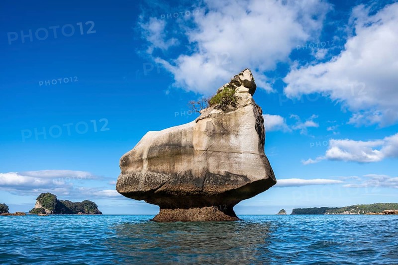 Cathedral Cove in New Zealand. Sea, sandy beach and limestone cliffs. The Smiling Sphinx rock. Cathedral Cove, Hahei, Coromandel Peninsula, Waikato, New Zealand