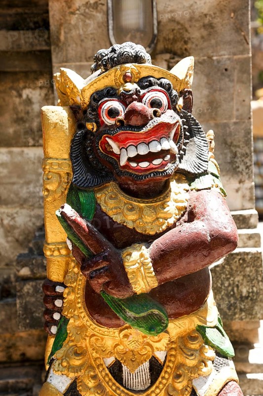 Demon, figure in Pura Dalem Penataran Taman, Sanur, Bali, Indonesia