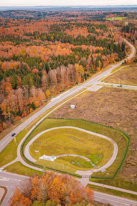 Roundabout surrounded by autumn leaves and extensive countryside, new Lindenrain industrial park, Calw, Black Forest, Germany