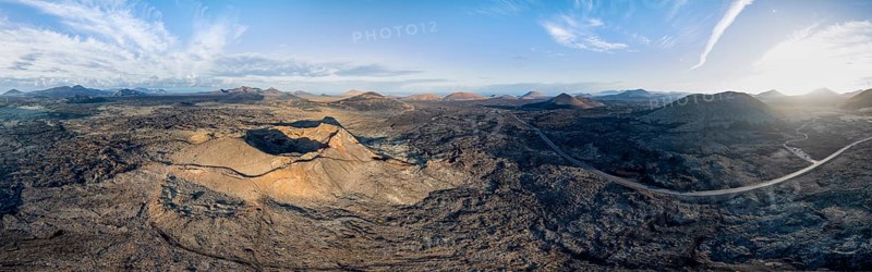 Panorama, Volcán de Las Nueces volcano, picturesque volcanic landscape with volcanic craters at sunrise, Los Volcanes Natural Park, aerial view, Lanzarote, Canary Islands, Spain