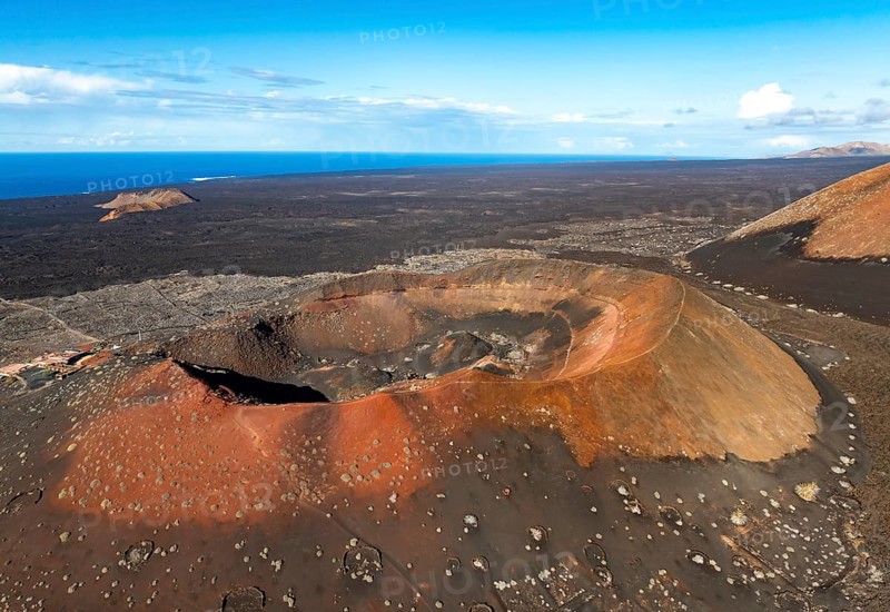 Montaña Quemada volcano, volcanic landscape with craters and lava fields, aerial view, Lanzarote, Canary Islands, Spain
