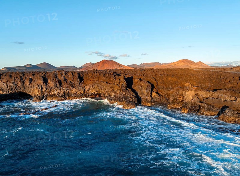 Coast with lava fields, volcanic landscape near Los Hervideros, in the evening light, aerial view, Lanzarote, Canary Islands, Spain