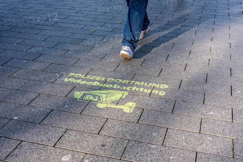 Note, sprayed on the ground that the police have set up comprehensive video surveillance in the city center of Dortmund, in front of the main train station, to prevent and investigate crimes, crime, North Rhine-Westphalia, Germany