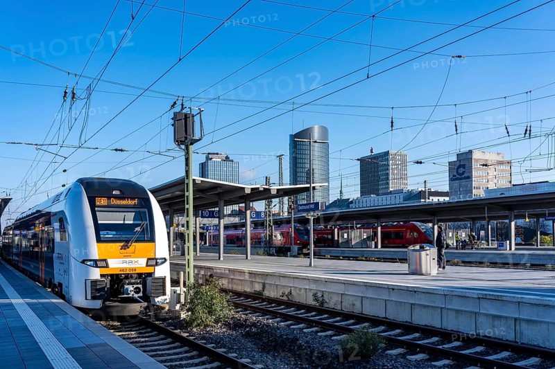The skyline of the city center of Dortmund as seen from the main train station, Rhine-Ruhr Express, RRX Zug, RE11, North Rhine-Westphalia, Germany