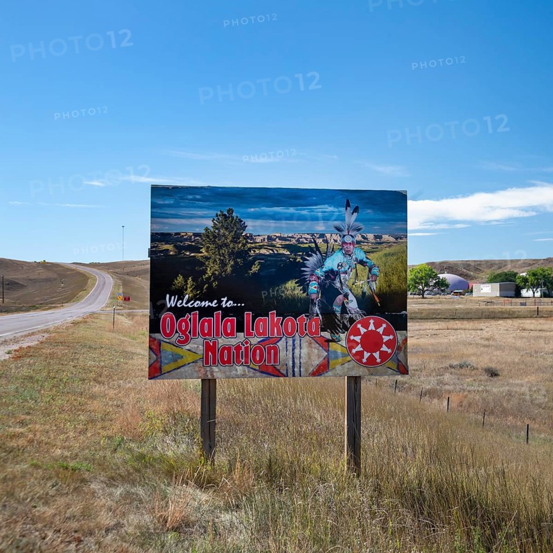 Red Shirt, South Dakota - A sign welcomes travelers to the Oglala Lakota Nation on the Pine Ridge Indian Reservation