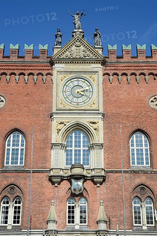 Facade of the town hall in Odense with the figures Power, Justice and Wisdom on top, Fyn, Funen island, Denmark, Scandinavia