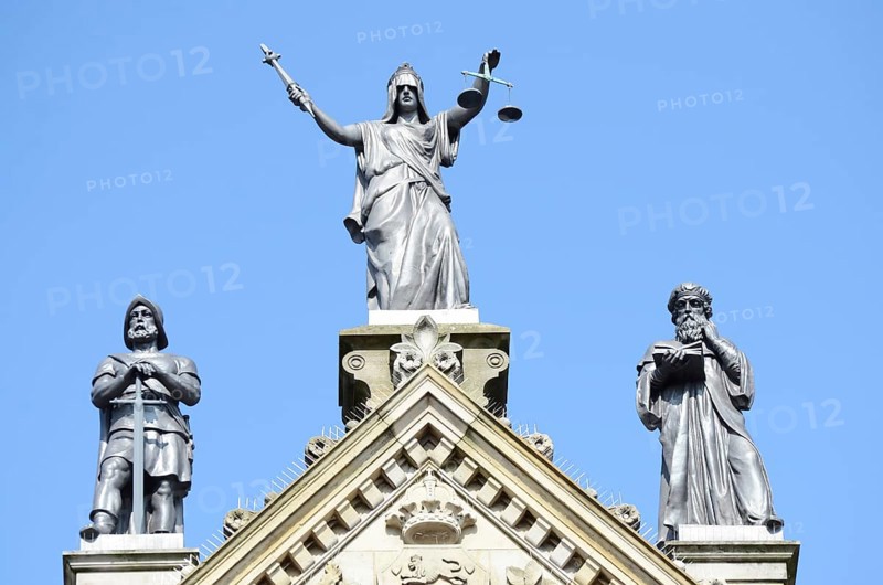 The figures Power, Justice and Wisdom on the town hall in Odense, Fyn, Funen island, Denmark, Scandinavia