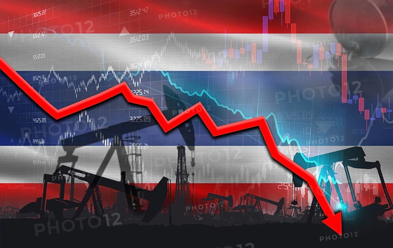 Crude crisis with Thai flag on financial graph. Fall oil price with flag of Thailand on economic chart
