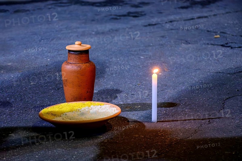 Offering to Exu, the orixa of Umbanda and Candomble on the streets of Belo Horizonte, Minas Gerais
