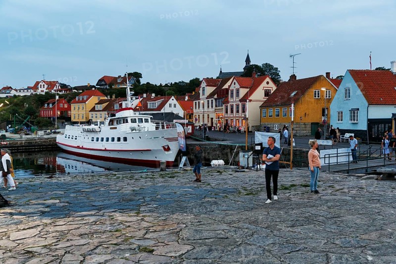 Harbour town, fishing village with half-timbered houses and ferry to the Pea Islands, Christiansø, dusk, Bornholm island, Denmark
