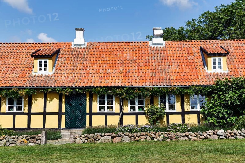 Traditional yellow timber-frame house in Nyker village, Bornholm, Denmark