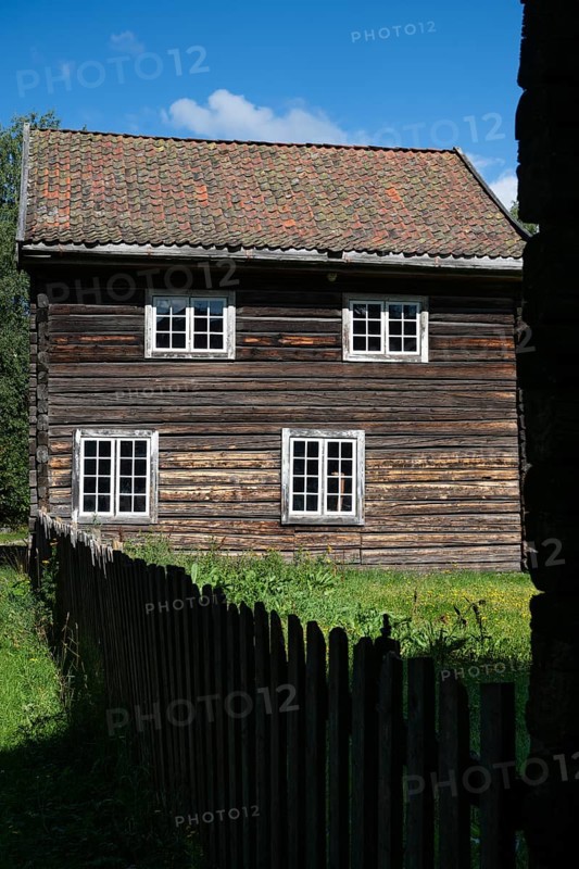 Wooden house on a historic farm, Maihaugen open-air museum with houses and objects from farms in Gudbrandsdal, Lillehammer on Lake Mjøsa, Innlandet Municipality, Norway