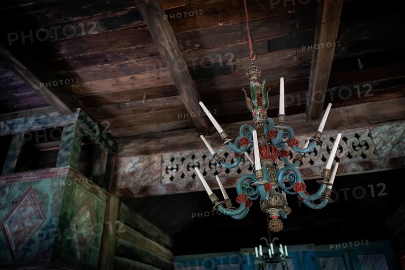 Old chandelier carved from wood, Maihaugen open-air museum with houses and objects from farms in Gudbrandsdal, Lillehammer am Mjøsa Lake, Innlandet County, Norway