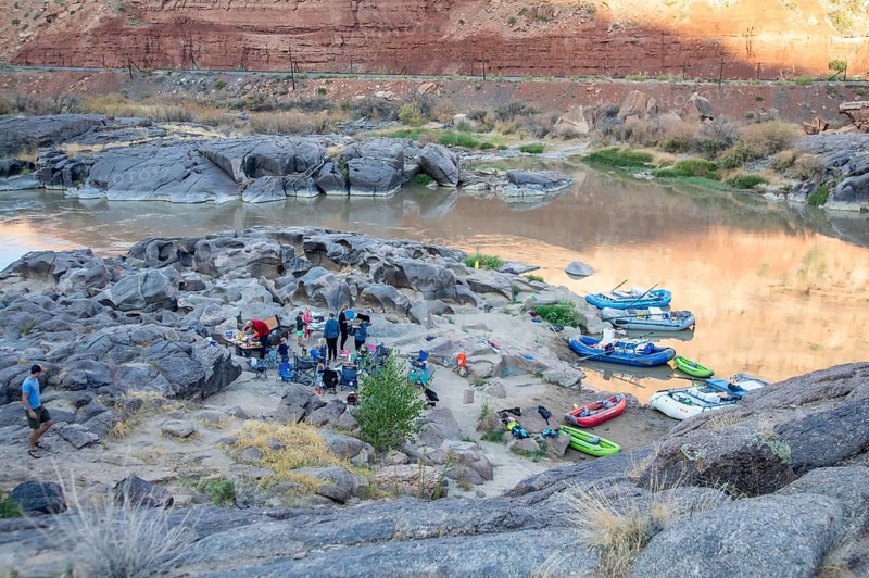 Loma, Colorado - Many children are part of a river rafting group camped in Ruby Canyon along the Colorado River