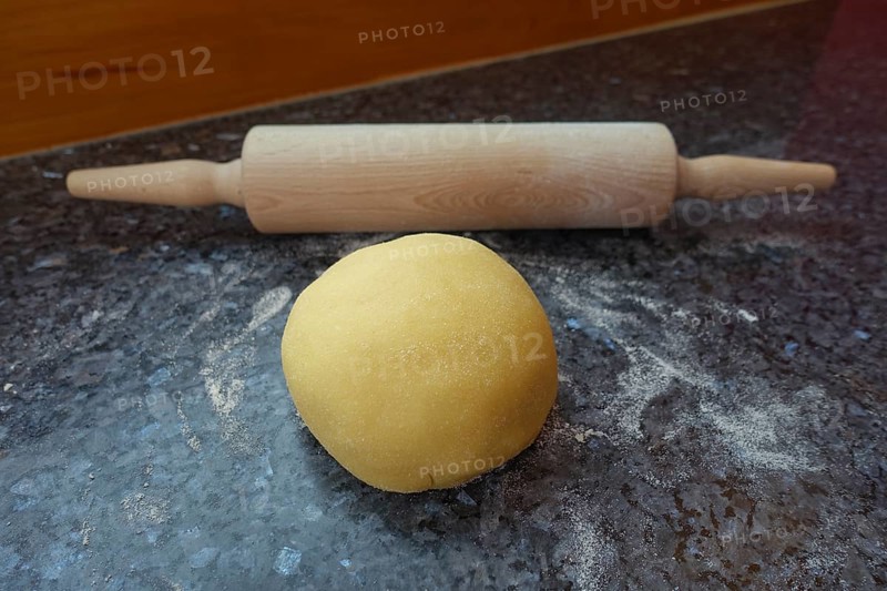 Southern German cuisine, preparation of shortcrust pastry, raw dough on the worktop, rolling pin, baking, out of the oven, vegetarian, flour, traditional cuisine, food photography, studio, Germany