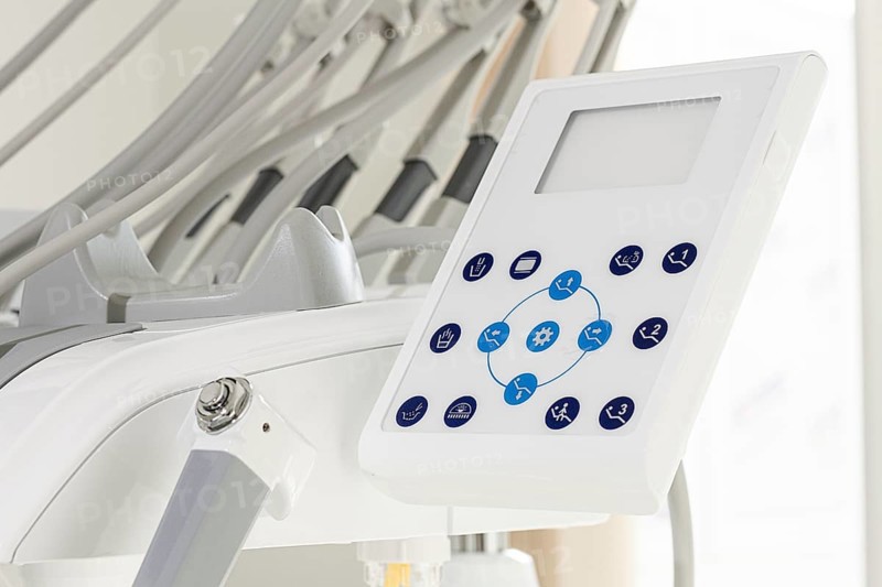 A close-up view of a dental equipment control panel showcasing various settings. This setup is commonly found in dental clinics, ensuring smooth operations during patient care