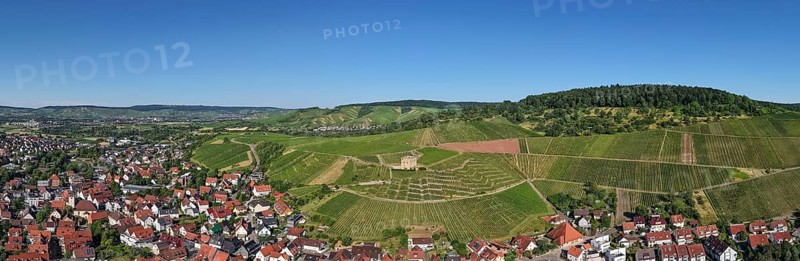 Wide panoramic view of a village and surrounding vineyards, Y-Burg, Stetten im Remstal, Baden-Württemberg, Germany
