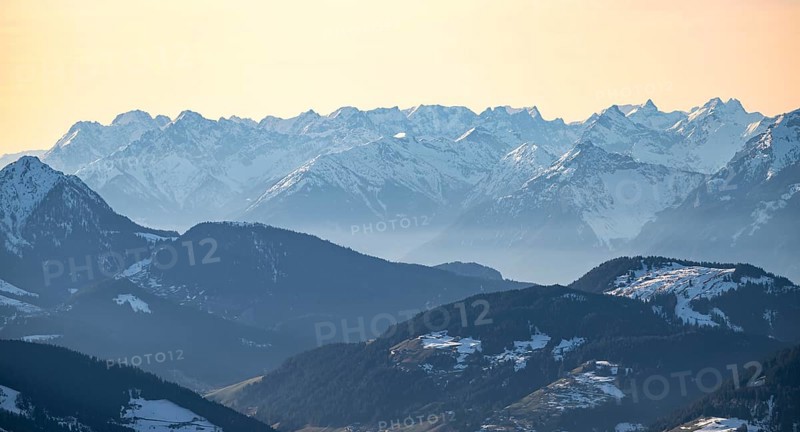 Mountain panorama with peaks of the Karwendel Mountains in winter in evening light, view from the Hohe Salve, Tyrol, Austria