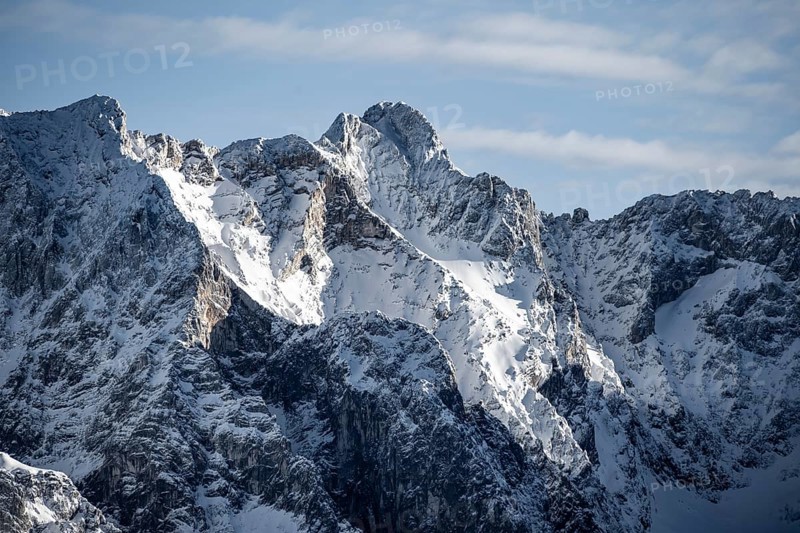 View of snowy peaks of Zugspitze, view from Längenfelderkopf in winter, Wetterstein Mountains, Garmisch-Partenkirchen, Bavaria, Germany