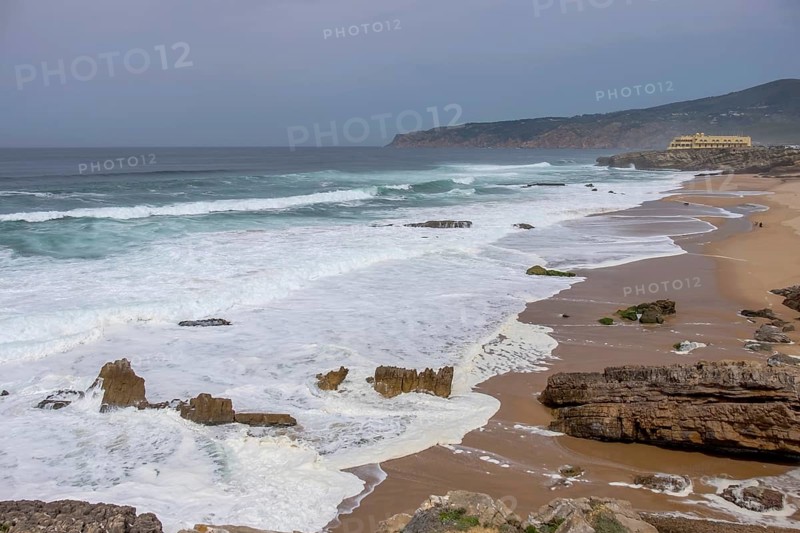 Praia da Cresmina, in the background Fortaleza do Guincho, now a 5-star hotel, Portugal
