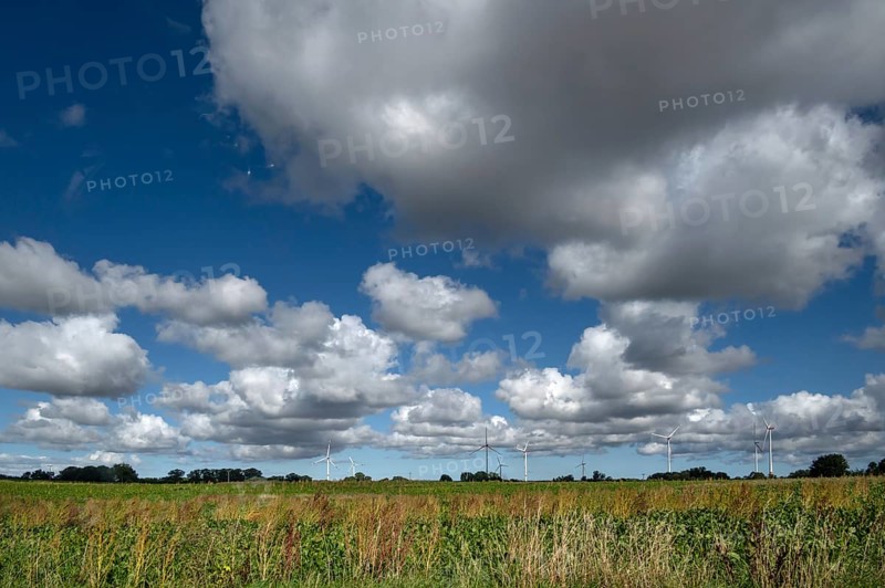 Landscape with wind turbines, cluster clouds (Cumulus), Mecklenburg-Western Pomerania, Germany