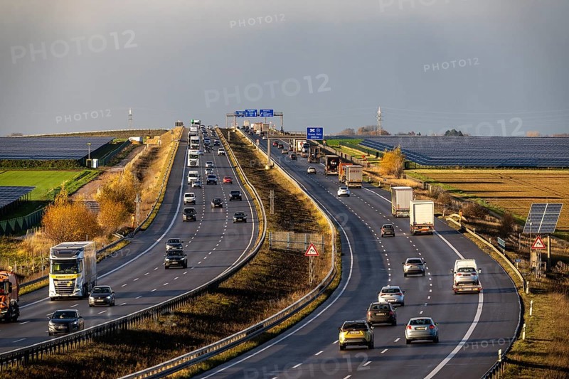 86.5 MW peak open-air photovoltaic systems, from RWE, with over 141, 000 solar modules, on a side strip, along the A44 motorway near Bedburg, at the Jackerath triangle, recultivated open-cast mining site, North Rhine-Westphalia, Germany