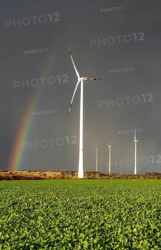 Königshovener Höhe onshore wind farm, on the A44 motorway near Bedburg, in front of the Jackerath triangle, autumn, rainbow, dark rain clouds, recultivated open-cast mining area, Garzweiler open-cast lignite mine, operated by RWE and the city of Bedburg, North Rhine-Westphalia, Germany