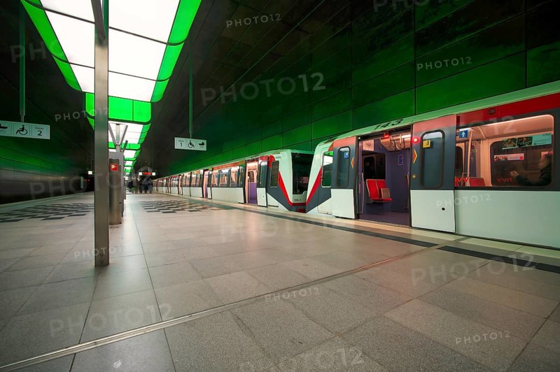 HafenCity University underground station, illuminated in color, green, underground train, U4, empty, platform, stop, train station, subway, sign, wheelchair access area, stroller, public transport, HVV, Hamburger Verkehrsverbund, Hochbahn, public transport, Free and Hanseatic City of Hamburg, Germany