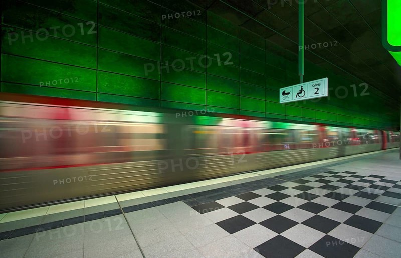 HafenCity University underground station, illuminated in color, green, underground train, movement effect, U4, platform, stop, train station, subway, sign, boarding area wheelchair user, stroller, public transport, HVV, Hamburger Verkehrsverbund, public transport, Freie und Hanseatic City of Hamburg, Germany