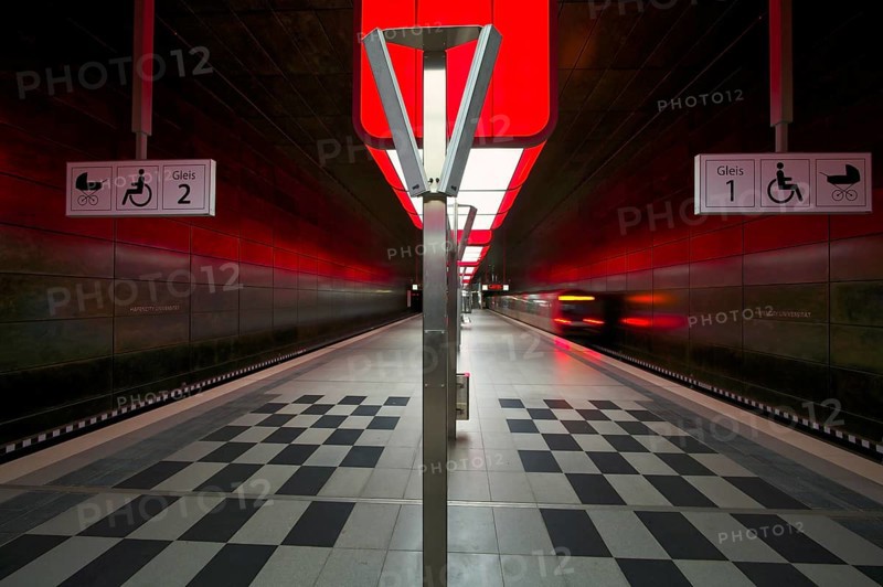 HafenCity University subway station, illuminated in color, red, underground train, movement effect, U4, empty, platform, stop, train station, subway, sign, boarding area wheelchair user, stroller, public transport, HVV, Hamburger Verkehrsverbund, Hochbahn, public transport, Free and Hanseatic City of Hamburg, Germany