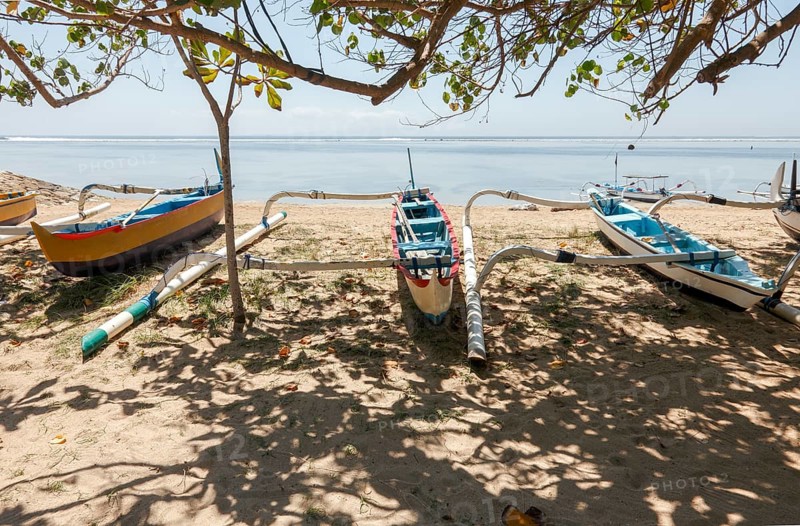 Fishing outrigger boats on Sanur beach, Bali, Indonesia