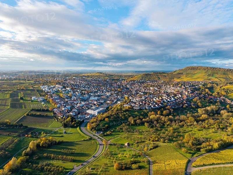 Aerial view of a village surrounded by hills and vineyards under cloudy sky, autumn, Korb-Steinreinach im Remstal, Baden-Württemberg, Germany