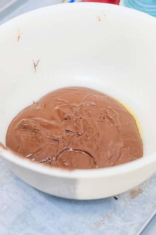 A white bowl of melted chocolate in the kitchen, Christmas baking, Haselstaller Hof, Wildberg, Germany