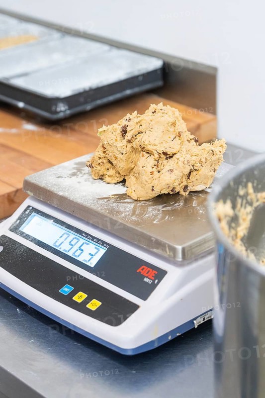 Dough ball placed on a digital scale in a kitchen, weight displayed, Christmas baking, Haselstaller Hof, Wildberg, Germany