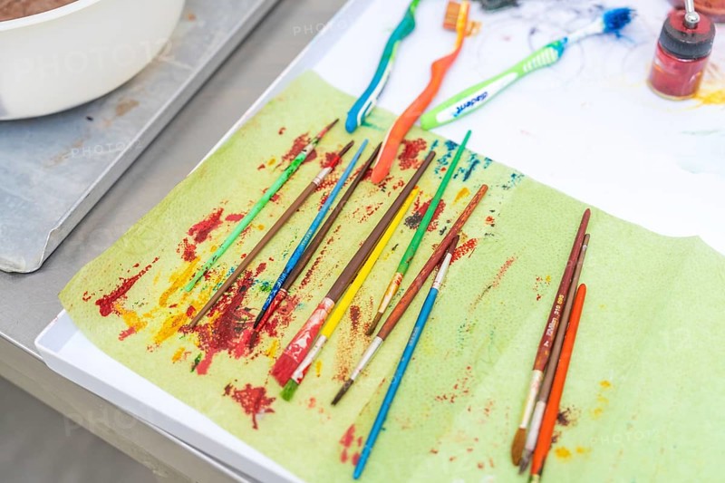 Colourful brushes and toothbrushes on a creatively designed table, Christmas baking, Haselstaller Hof, Wildberg, Germany