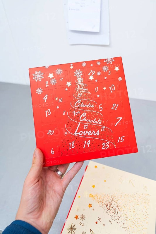 Red advent calendar for chocolate lovers with printed snowflakes, Christmas baking, Haselstaller Hof, Wildberg, Germany