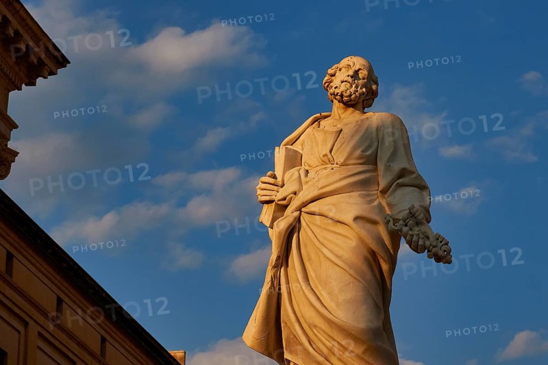 Syracuse, cathedral, imposing ancient statue against a blue, cloudy sky, Baroque towns of Sicily, Baroque corner of Sicily, late Baroque towns of Val di Noto, UNESCO World Heritage Site, Sicily, Italy