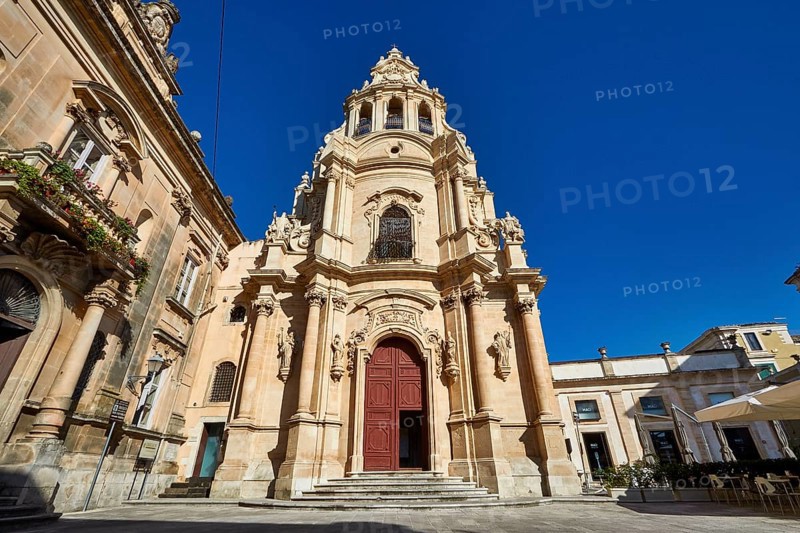 Ragusa, Baroque church with imposing façade against clear blue sky in Sicily, Baroque towns of Sicily, Baroque corner of Sicily, late Baroque towns of Val di Noto, UNESCO World Heritage Site, Sicily, Italy