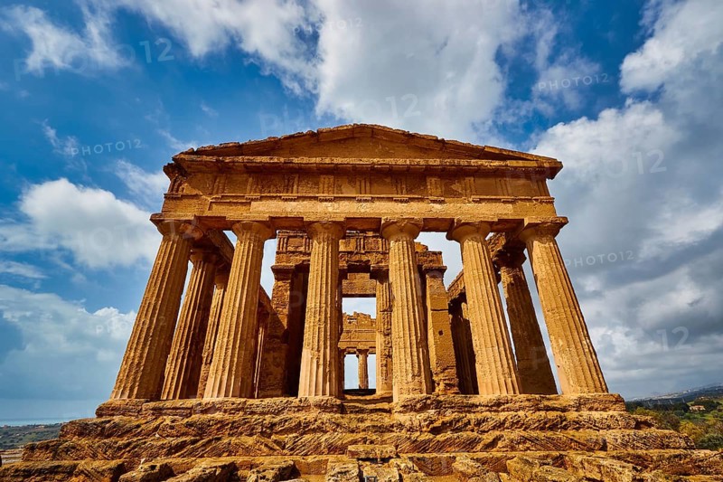Temple of Concordia, imposing ancient temple with columns under a blue sky, Valley of the Temples, Valle dei Templi, Archaeological Site, UNESCO World Heritage Site, Agrigento, Sicily, Italy