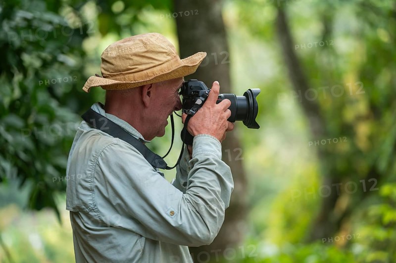 Photographer taking pictures, Amani Nature Forest Reserve, Eastern Usambara Mountains, Tanga, Tanzania
