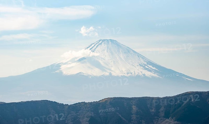 Snow-covered summit of Mount Fuji volcano in spring, Owakudani, Hakone, Japan